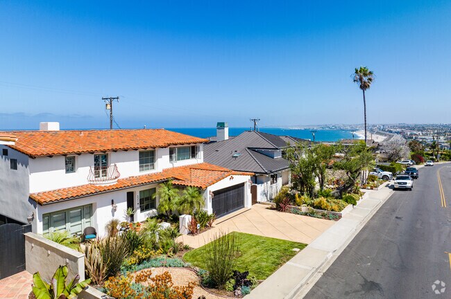 Two story Mediterranean style homes are found lining the hills of Riviera, CA.