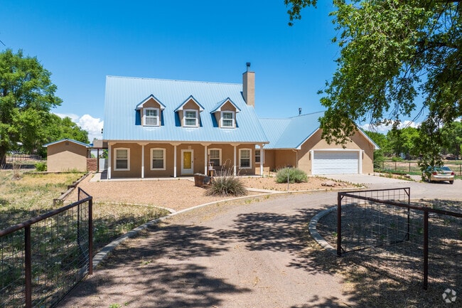 Adelino's ranch homes are often large with gates and fences to keep animals and livestock safe.