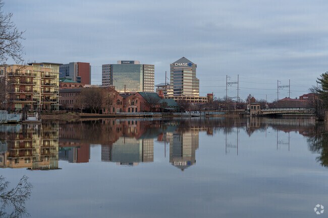 The setting sun can be seen reflecting off of office buildings in Downtown Wilmington.