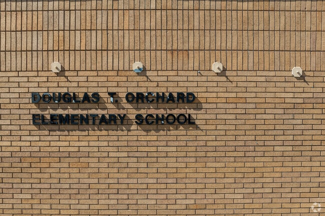 Bricks laid in different patterns create an interesting facade at Douglas T. Orchard Elementary.