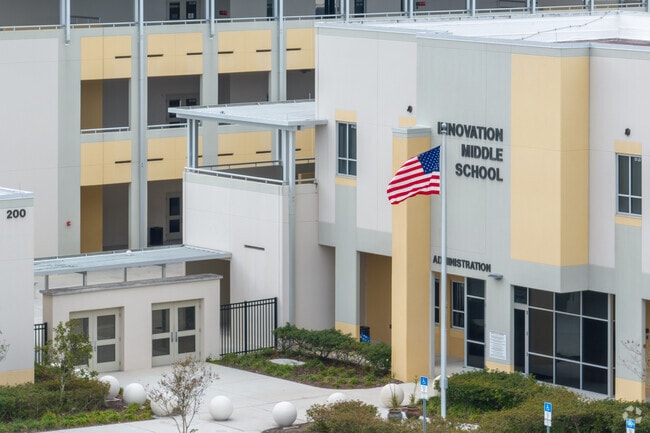 The American flag proudly graces the entrance to Innovation Middle School.