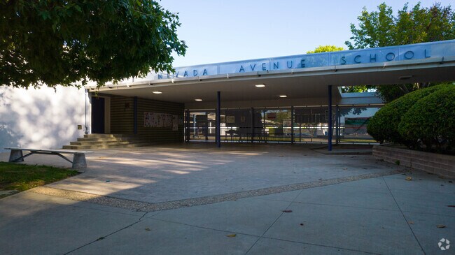 Morning greetings at Nevada Avenue Elementary School welcome West Hills children.