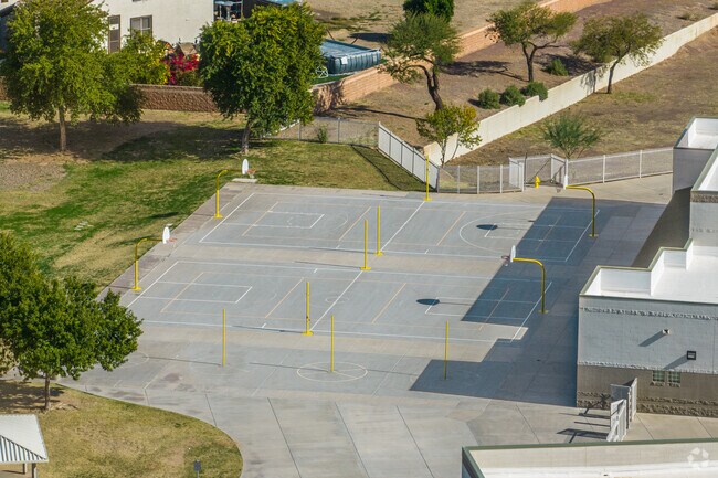 Scoring hoops at the basketball court of Mountain View School in Waddell.