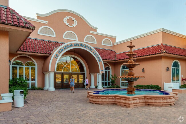 La Hacienda Recreation Center offers a pool and pickleball courts for residents.