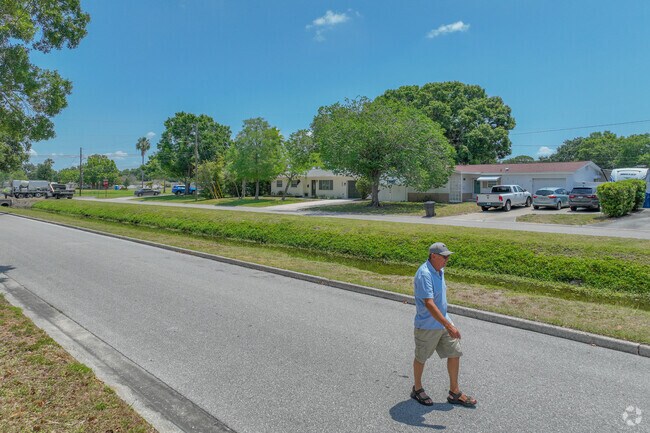 Residents of Fossil Park walk around the neighborhood for their daily exercise.