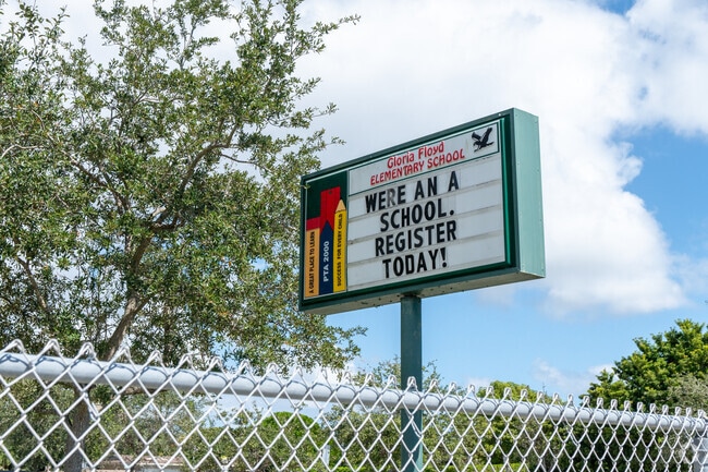 Gloria Floyd Elementary School sign welcomes students, staff, and  parents in Miami, FL.