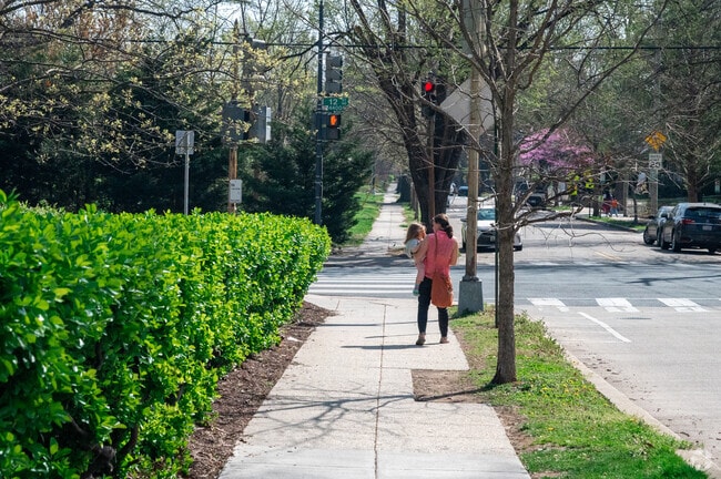 A mother and daughter taking a walk down Varnum St NE in Michigan Park