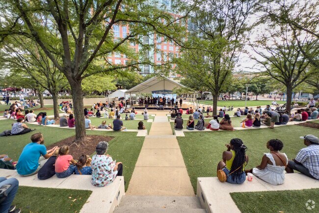 Locals gather for live music at the Reston Multicultural Festival in Reston Town Center.