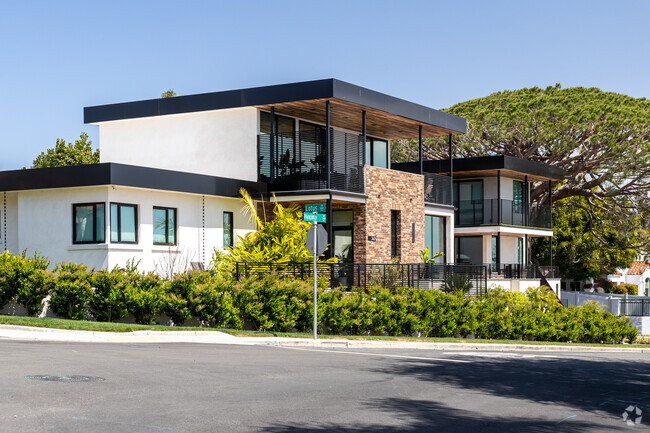 Larger custom homes such as this modern one can be found near the east end of Loma Portal.