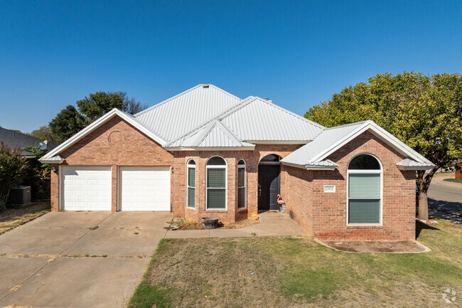 University Pines features beautiful brick houses with large front porches.