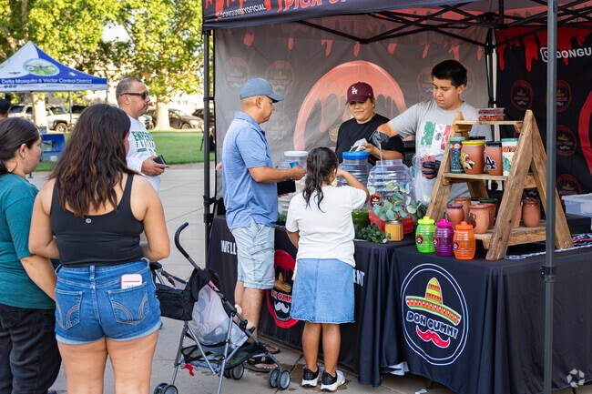 Residents line up to sample something sweet at the Dinuba Farmers Market.