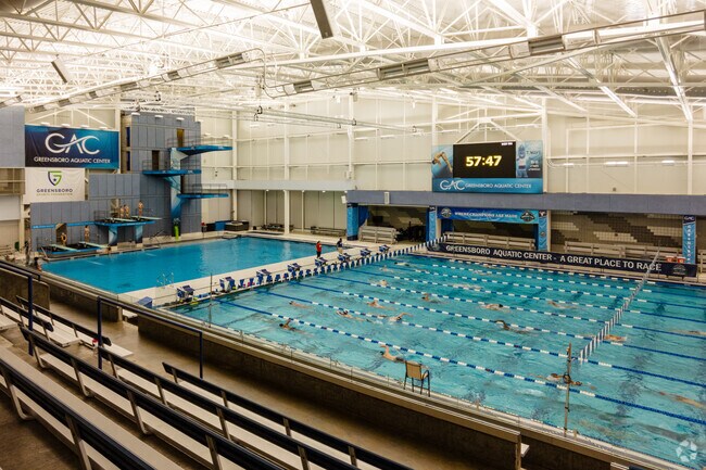 Witness the energy of visitors at Greensboro Aquatic Center in Hunter Hills.