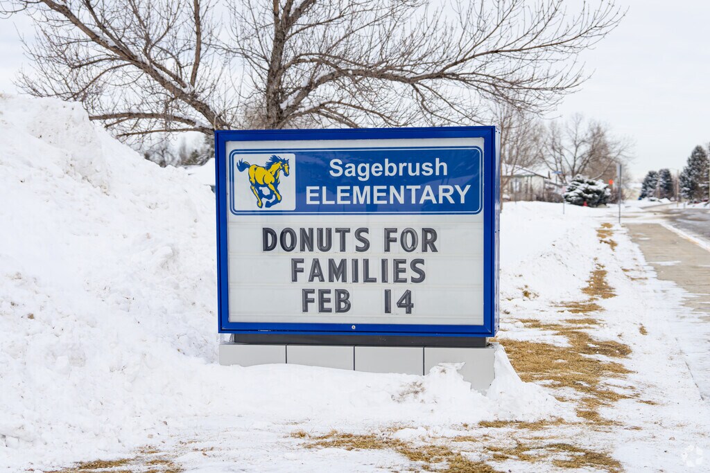 A small marquee at the entrance to Sagebrush Elementary informs parents of events.
