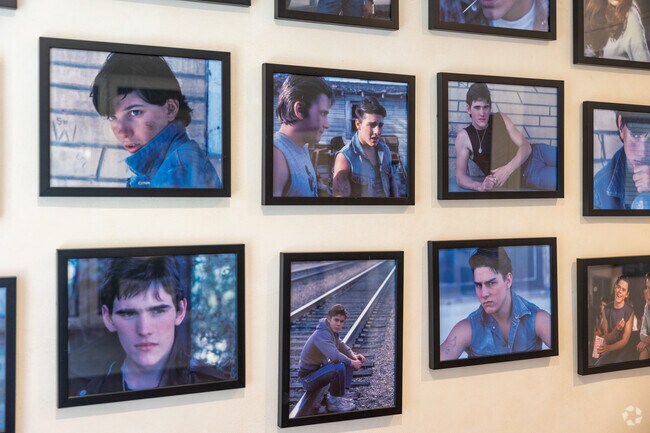 Pictures of the actors hang on display at 