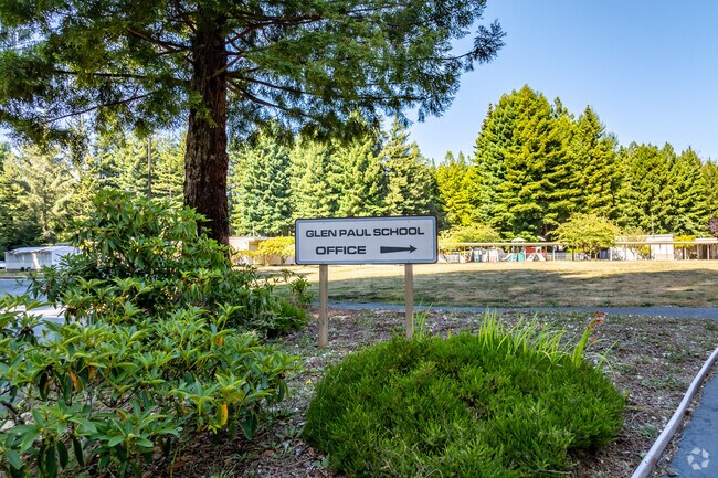 Tall trees at Glen Paul School provide shade throughout the campus.
