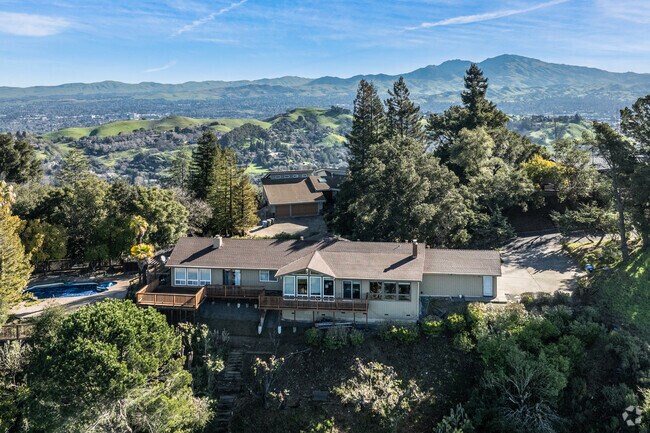 Luxury homes in Springhill sit atop the hills, offering stunning panoramic views.