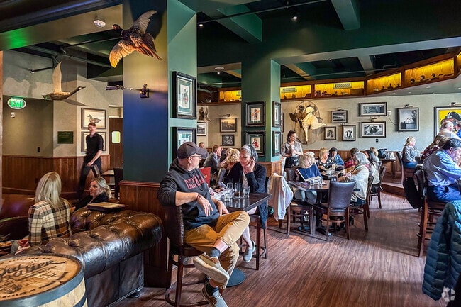 Guests enjoy food and drinks at The Hunt Room, a favorite in Linkhorn Park.