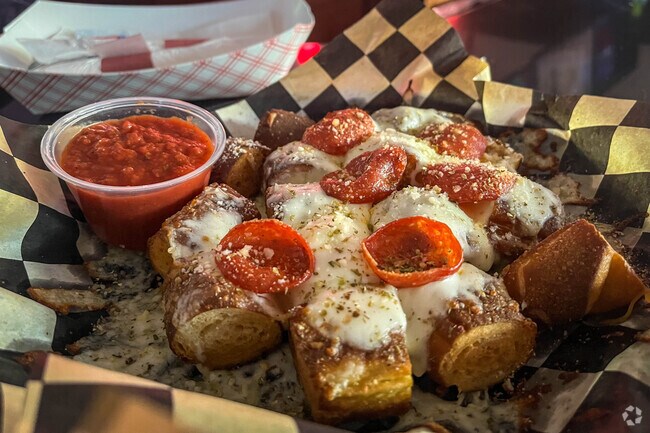 Enjoy some Pretzel bites tossed in garlic parmesan at Pastime Pub.