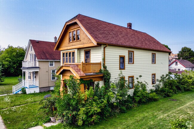 Bungalows are common in Grover Heights, many with jerkinhead roofs.