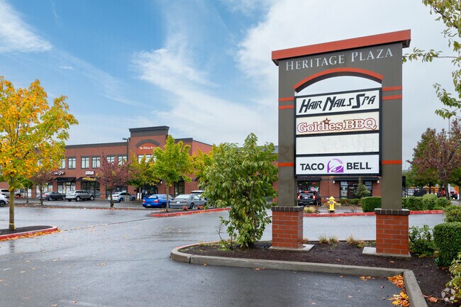 Heritage Plaza offers shopping and dining in Fisher’s Village‑Orchards.