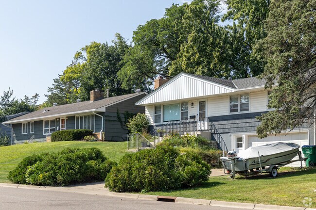 Some homes in Willow Park feature lush landscaping.