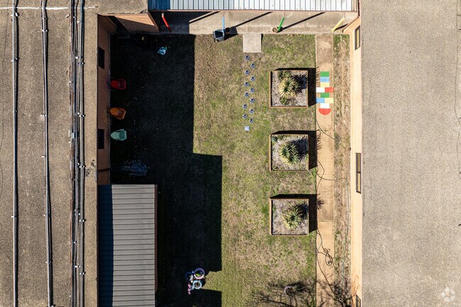 Students at Bishop Elementary School have the opportunity to practice gardening.
