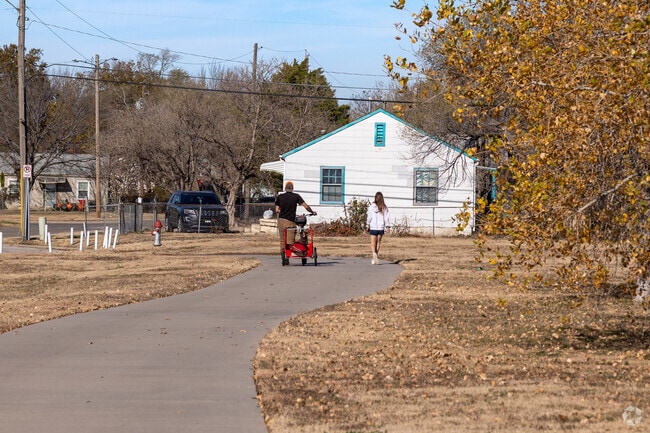 Enjoy an afternoon walk through the paths at Planeview United Park.