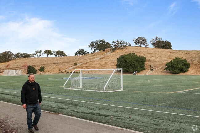Pacheco neighborhood resident stay active by walking at hidden Lake Park.