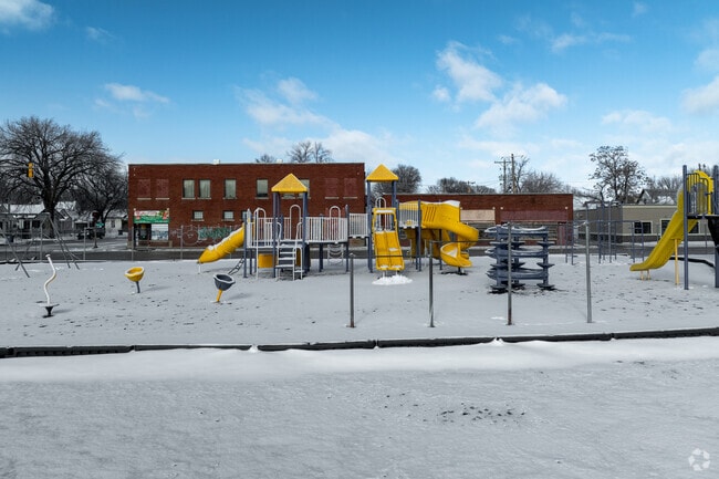 Kids can climb on the playground at Harry St Elementary.