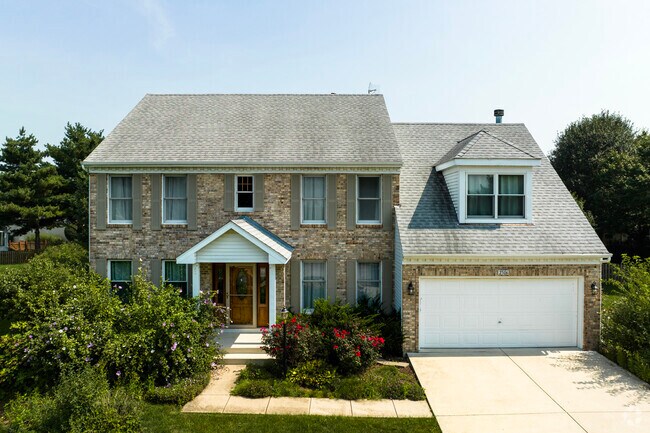 A brick colonial revival inspired home in Blackberry Countryside.