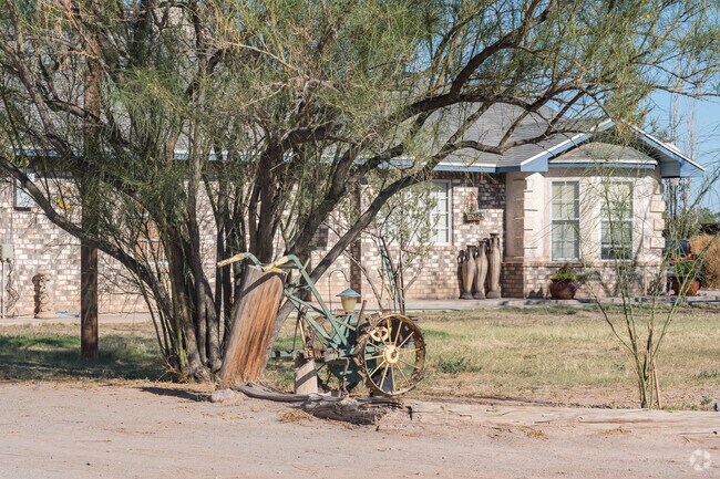 Many Mesquite homes are decorated with old farming machinery.