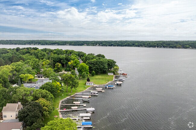 Find a home right on the water in Delafield Town.
