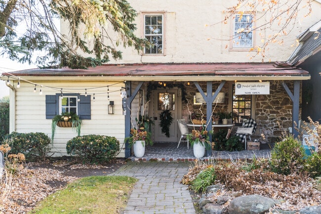 Painted Table Designs brings home decor to a rustic porch.
