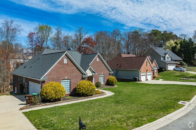 Modern brick homes in Hickswood are set on well-maintained yards.