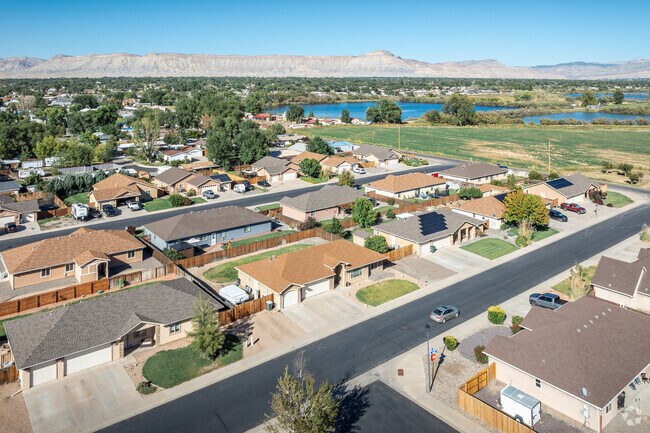 Find new housing developments next to farmland in Southeast Grand Junction.