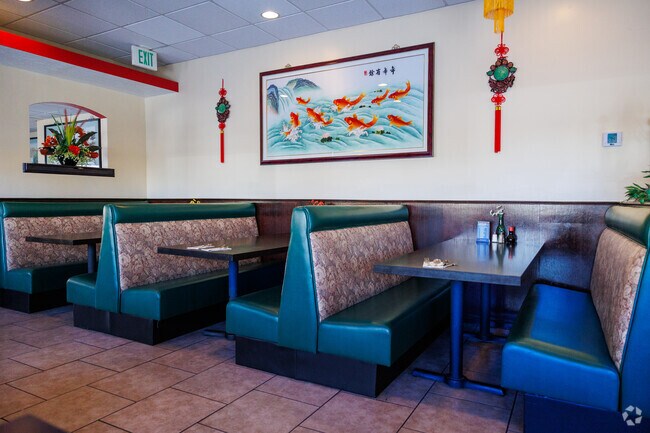 Blue padded booths are inviting in this Chinese restaurant.