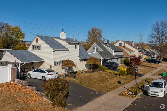 Cape Cod homes take on a unique design in Indian Creek with cascading roofing.
