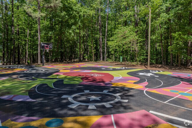Stone Hogan Park boasts a vibrant collection of basketball courts, each uniquely adorned by local artists with stunning murals that bring the space to life.