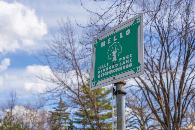 The neighborhood sign for Hale and nearby neighborhoods welcomes people as they enter.