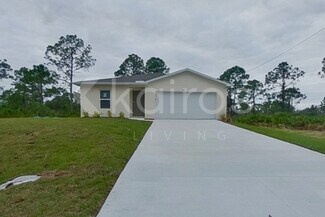 1127 Bayliss St E, Lehigh Acres, FL 33974