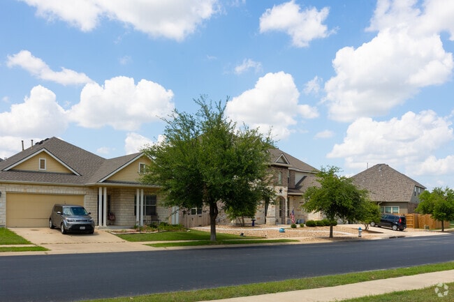 A row of newly developed national and traditional brick homes in Serenada.