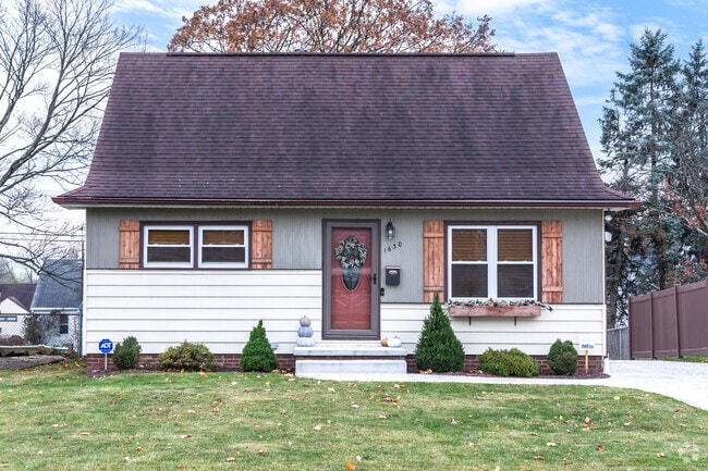 Beautiful home decor and custom made shutters adorn the front of this home in Plain Township.