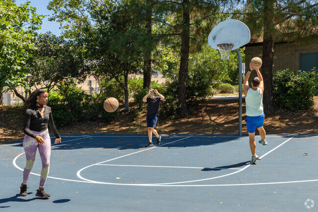 Orcutt friends gather and warm up for a friendly game of basketball at a nearby park.