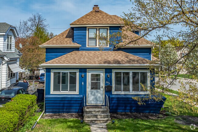A vibrant craftsman-style bungalow shines in Woodlawn Manor.