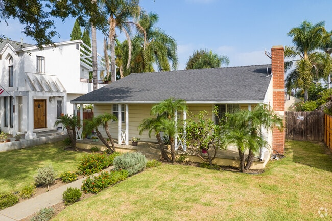 Opt for a colorful ranch style home with a small front yard in Gardena, CA.