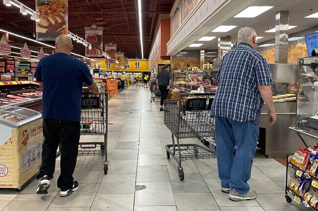Inside Tony's Fresh Market Freedom Park residents decide what to get for dinner.