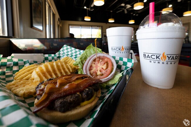 Backyard Burgers on East 23rd dishes up delicious burgers, fries, and shakes.