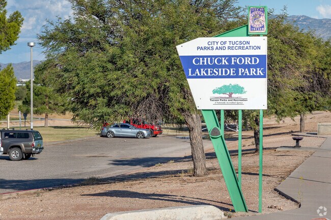 Residents enter Chuck Ford Lakeside Park to access walking trails and fishing spots.