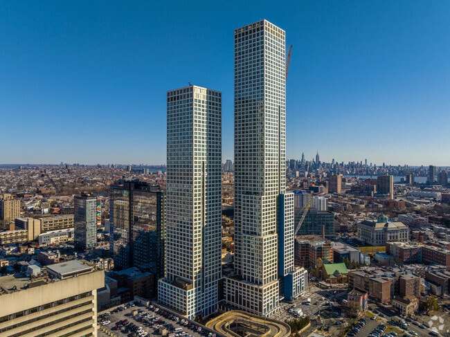 Modern High-Rise Buildings in Jersey Square are beautiful.