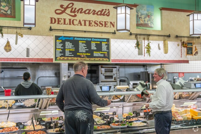 At Lunardi's in Danville, friendships are strengthened waiting for a deli sandwhich.